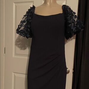 Chic Navy Dress with Textured Sleeves